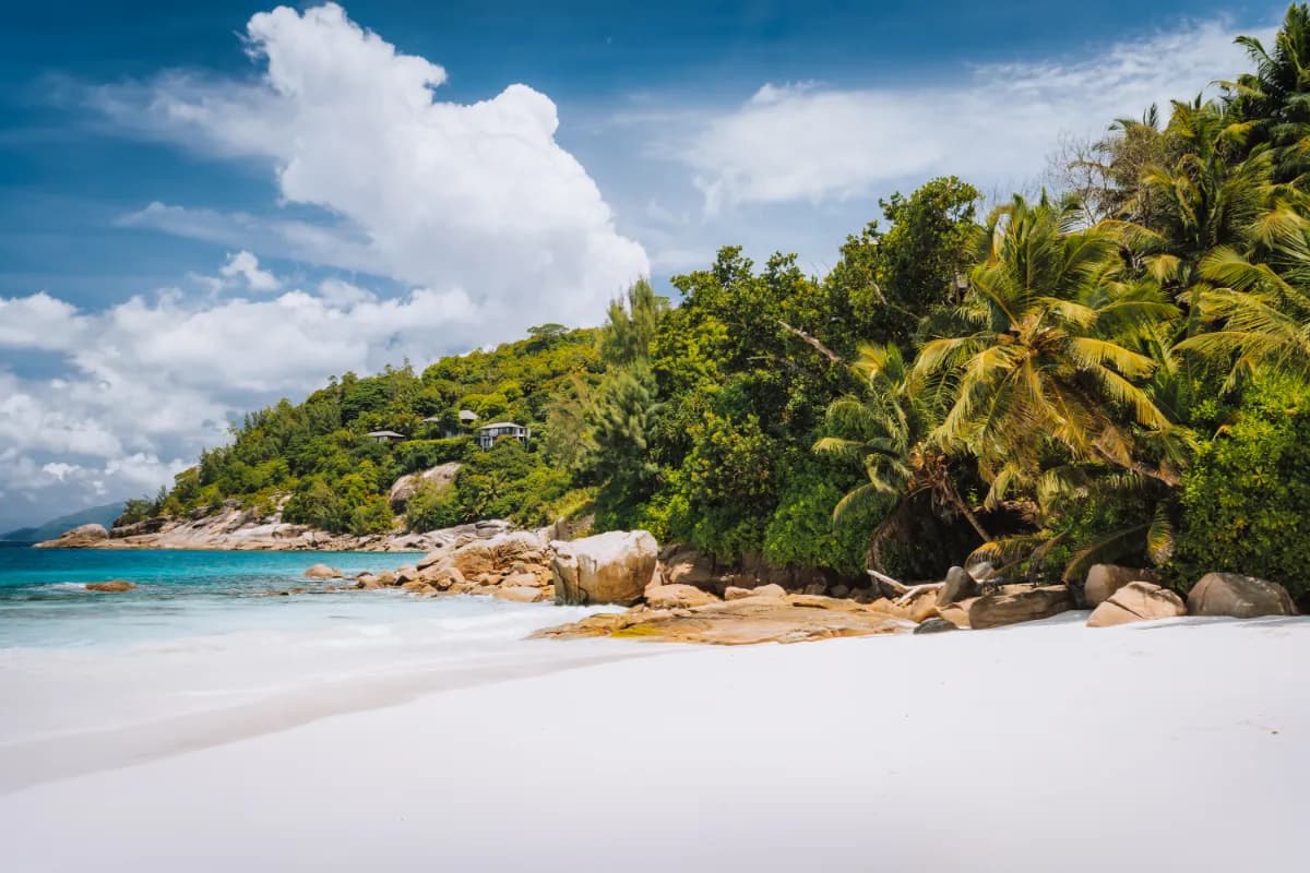 Petite Anse scenic beach in Seychelles known for turquoise waters, white sand, and luxury resort surroundings.