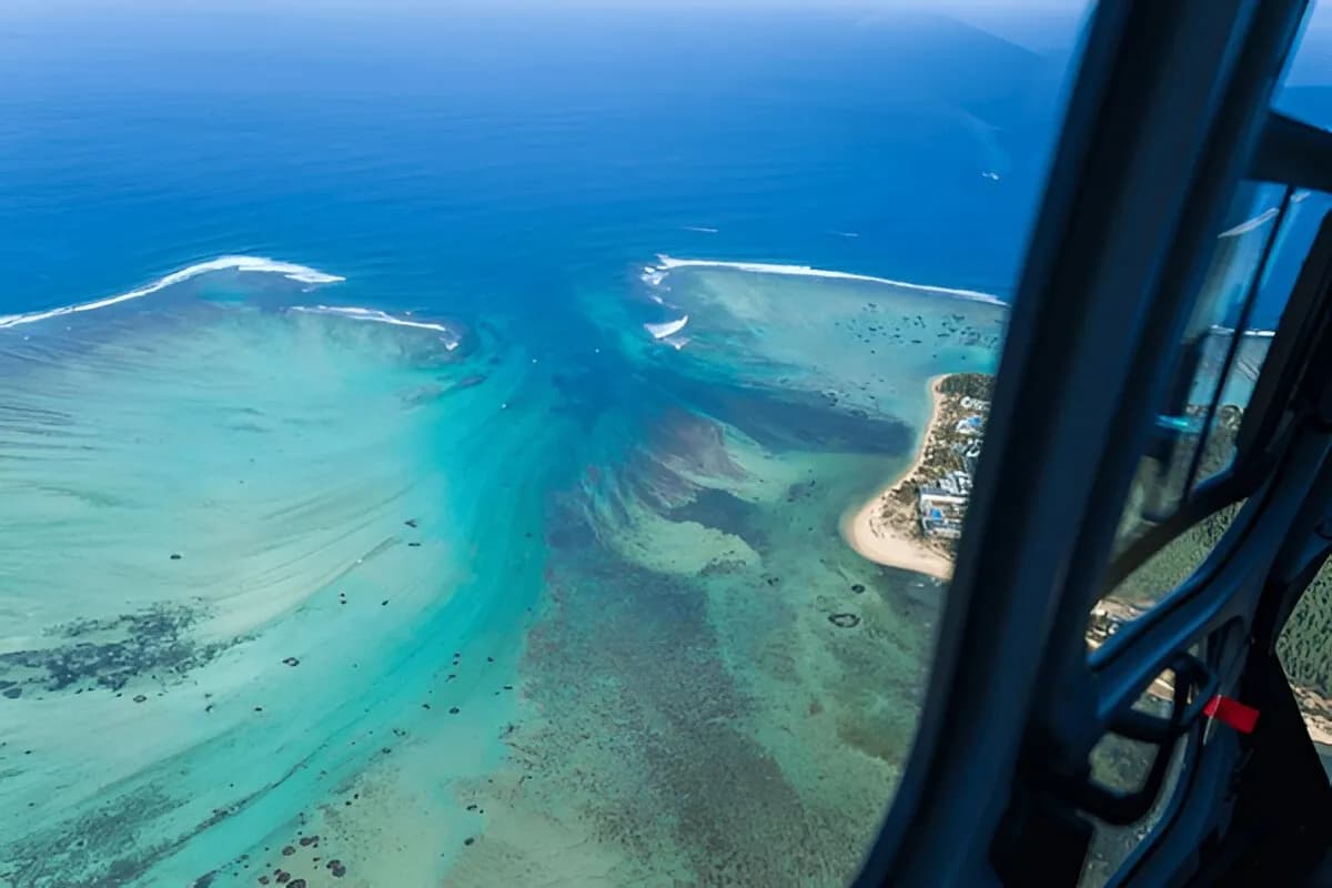 Take a Helicopter Ride to Underwater Waterfalls