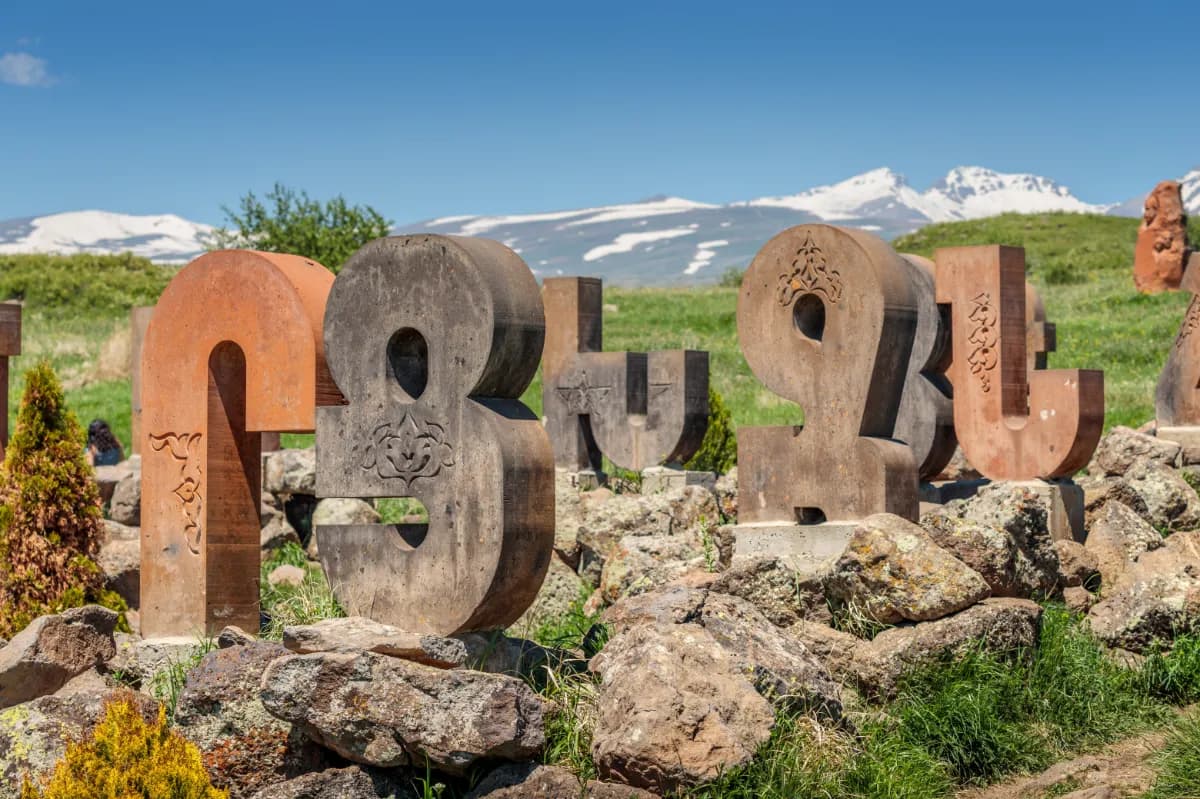 Armenian alphabet monument with stone sculptures