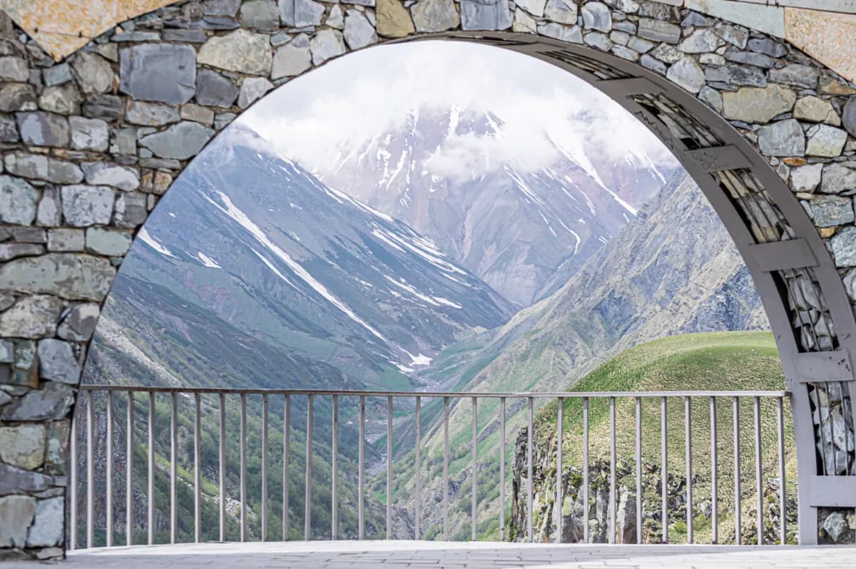 Russia–Georgia Friendship Monument colorful panoramic monument in Gudauri known for its circular mosaic murals and breathtaking Caucasus mountain views.