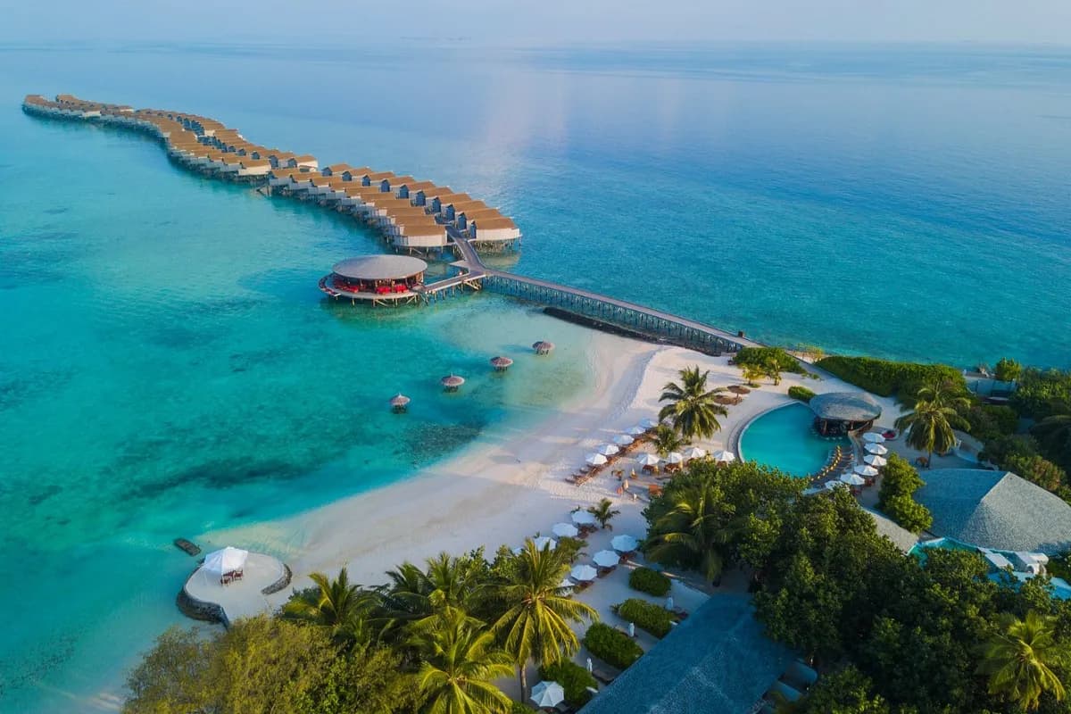 Bandos Maldives popular island resort in the Maldives known for white-sand beaches, vibrant coral reefs, water sports, and family-friendly experiences.
