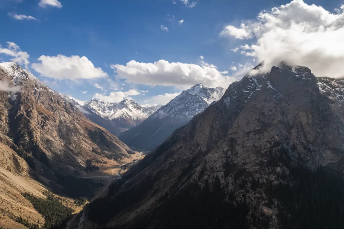 Altai Mountains majestic mountain range in Kazakhstan known for snow-capped peaks, alpine landscapes, pristine lakes, and breathtaking natural scenery.