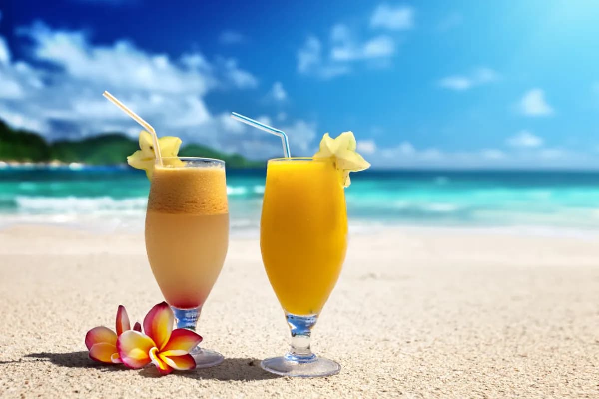 fruit juice refreshing beverages made from fresh tropical fruits like mango, pineapple, papaya, and coconut, commonly enjoyed in island destinations like Seychelles.