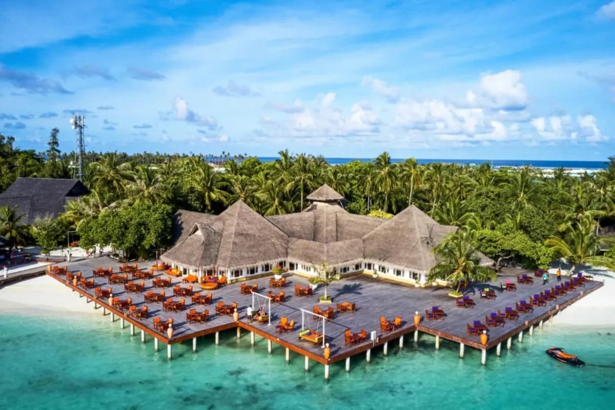Fihalhohi Island tropical island in the Maldives known for crystal-clear waters, white-sand beaches, vibrant coral reefs, and relaxing resort experiences.