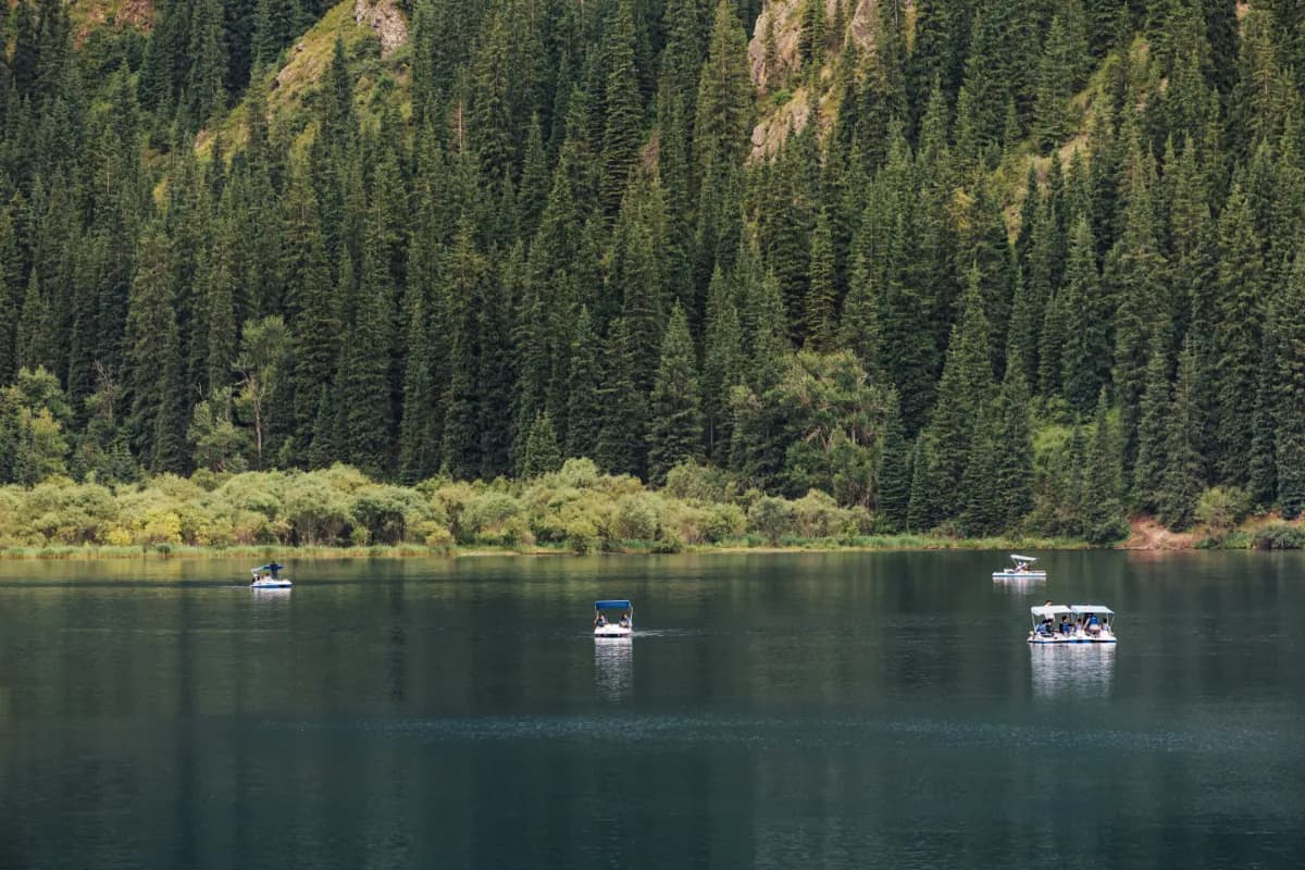 Kolsai Lakes stunning mountain lake system in Kazakhstan known for crystal-clear waters, forested surroundings, hiking trails, and breathtaking alpine scenery.
